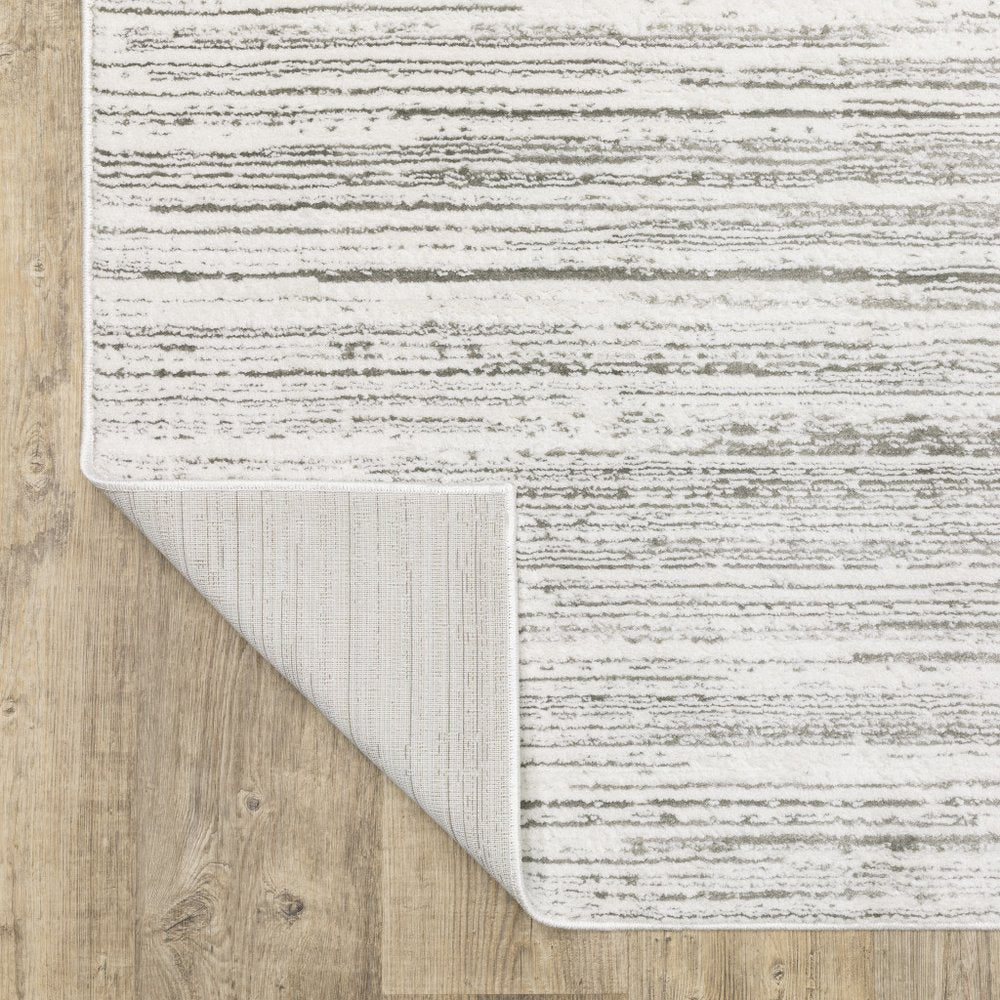 8' X 11' White And Gray Abstract Distressed Area Rug
