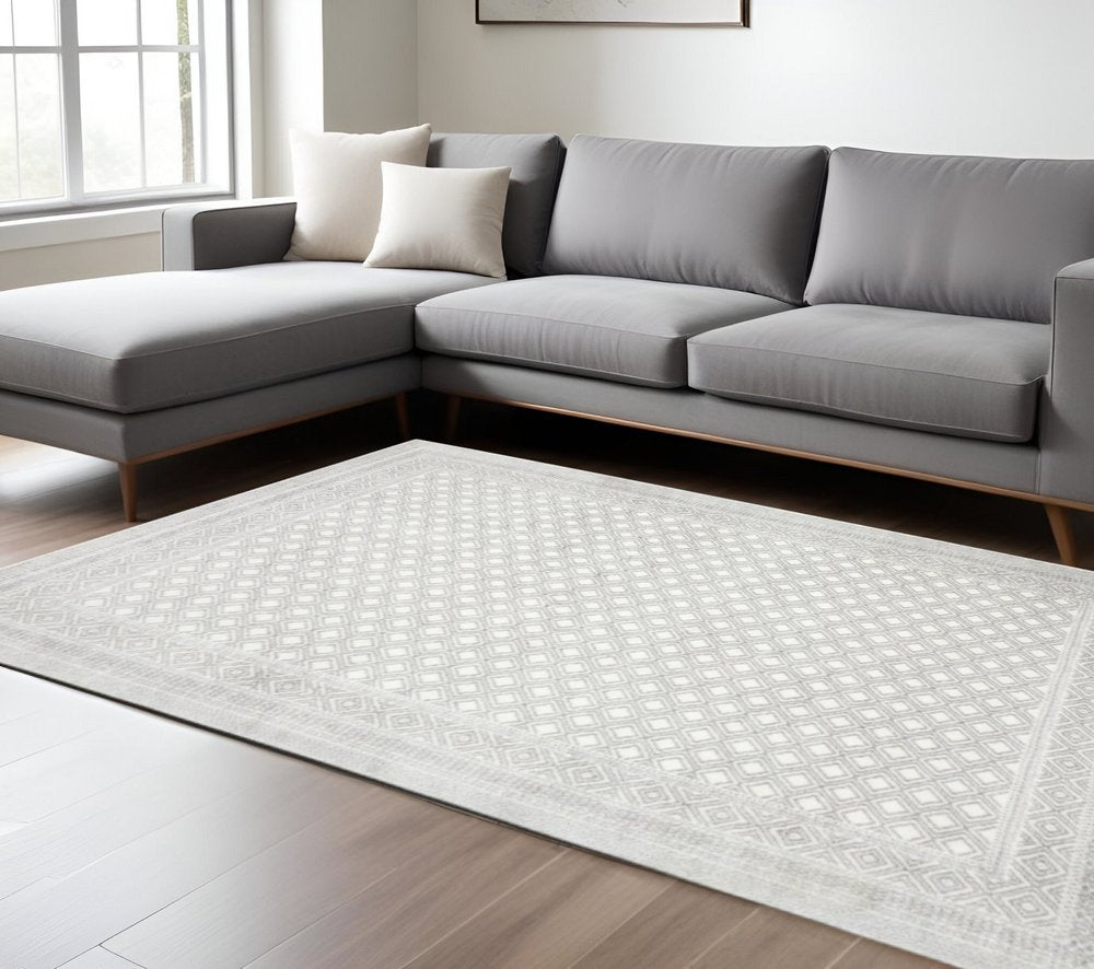 10' X 13' White And Grey Oriental Power Loom Stain Resistant Area Rug