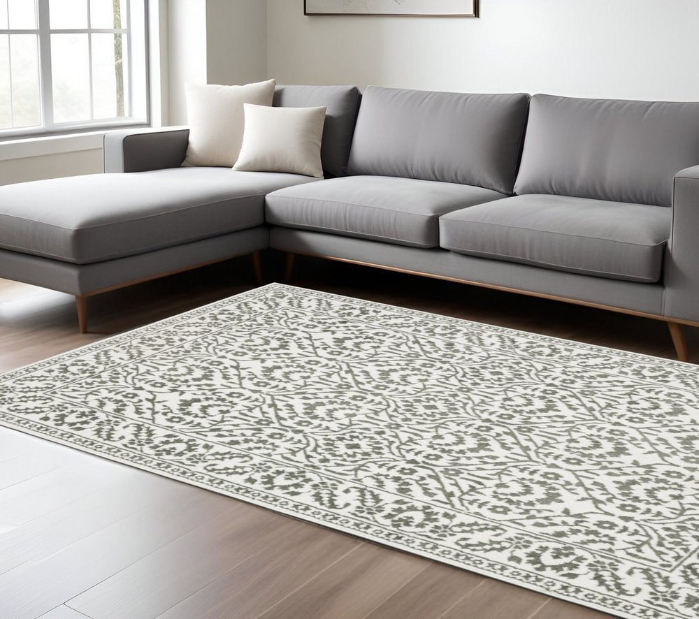 8' X 11' Gray And White Floral Distressed Area Rug