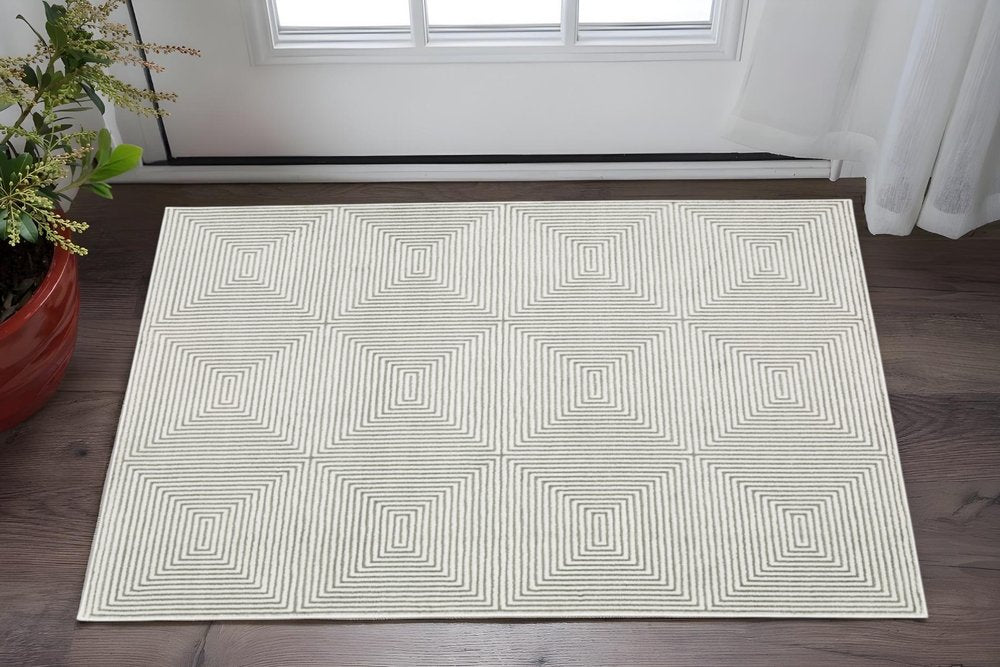 3' X 5' Grey And White Geometric Power Loom Stain Resistant Area Rug