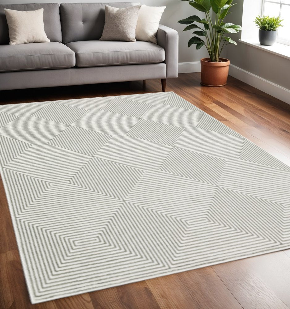 5' X 8' Grey And White Geometric Power Loom Stain Resistant Area Rug