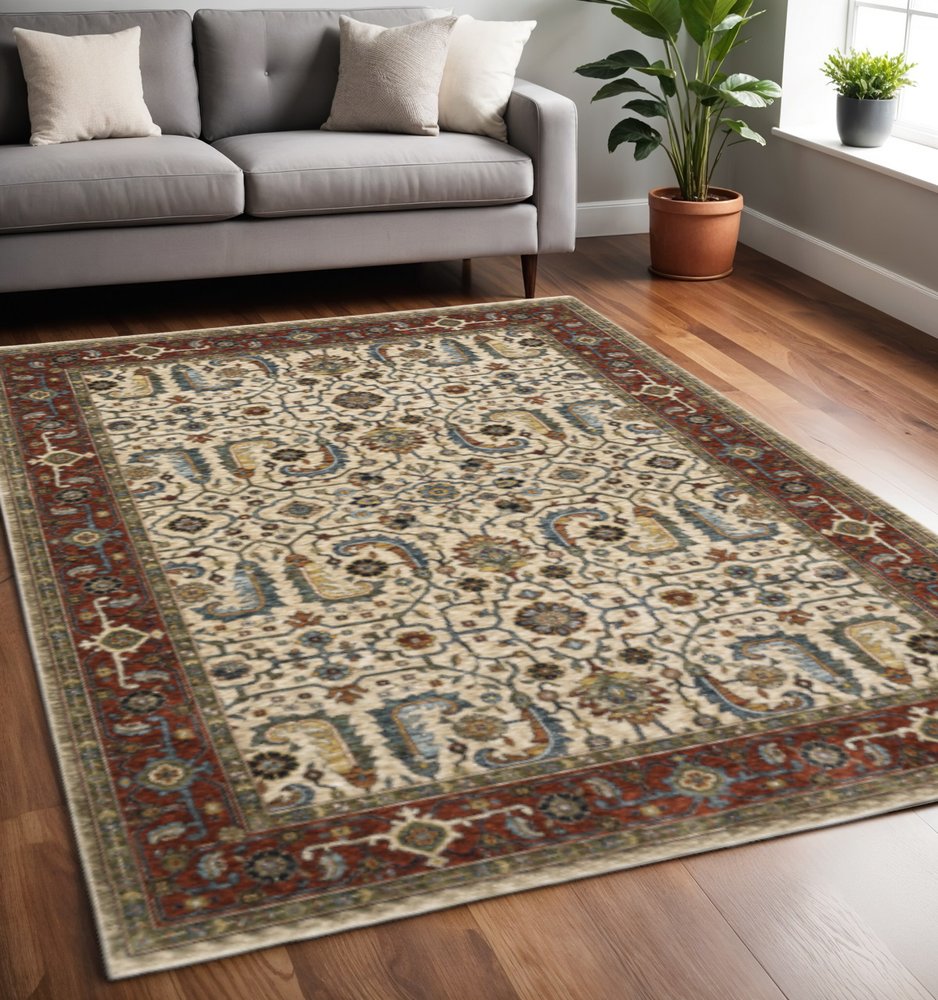 5' X 8' Ivory Red Green Grey Blue And Navy Oriental Power Loom Stain Resistant Area Rug With Fringe