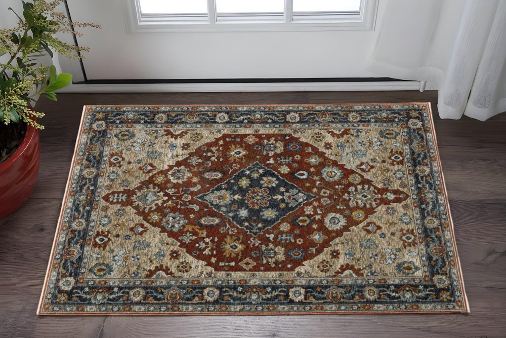 3' X 5' Blue Beige Tan Brown Gold And Rust Red Oriental Power Loom Stain Resistant Area Rug With Fringe