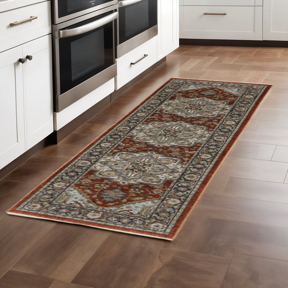 2' X 8' Blue Beige Grey Gold Green And Rust Red Oriental Power Loom Stain Resistant Runner Rug With Fringe