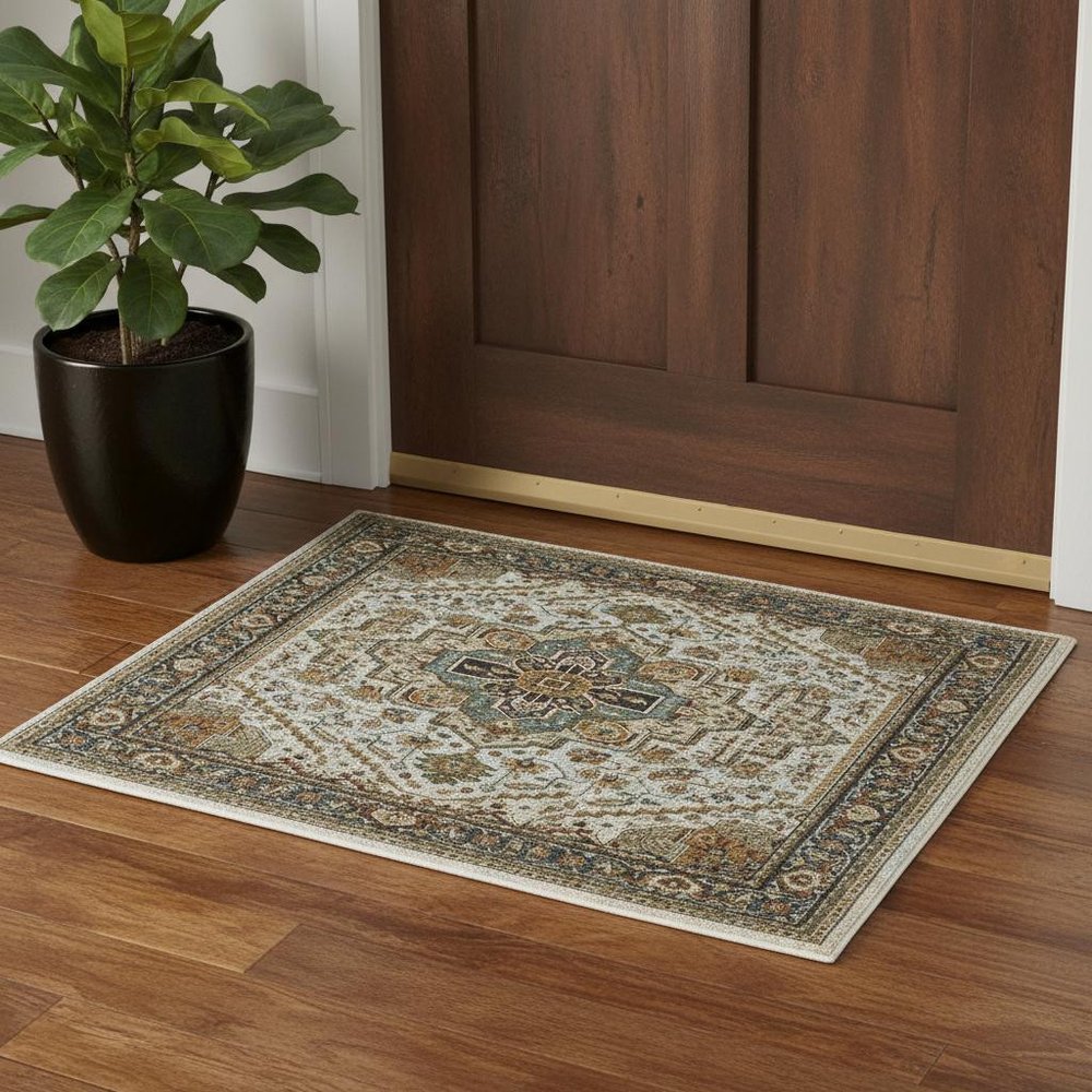 2' X 3' Ivory Beige Blue Orange Gold Green Grey And Rust Oriental Power Loom Stain Resistant Area Rug With Fringe