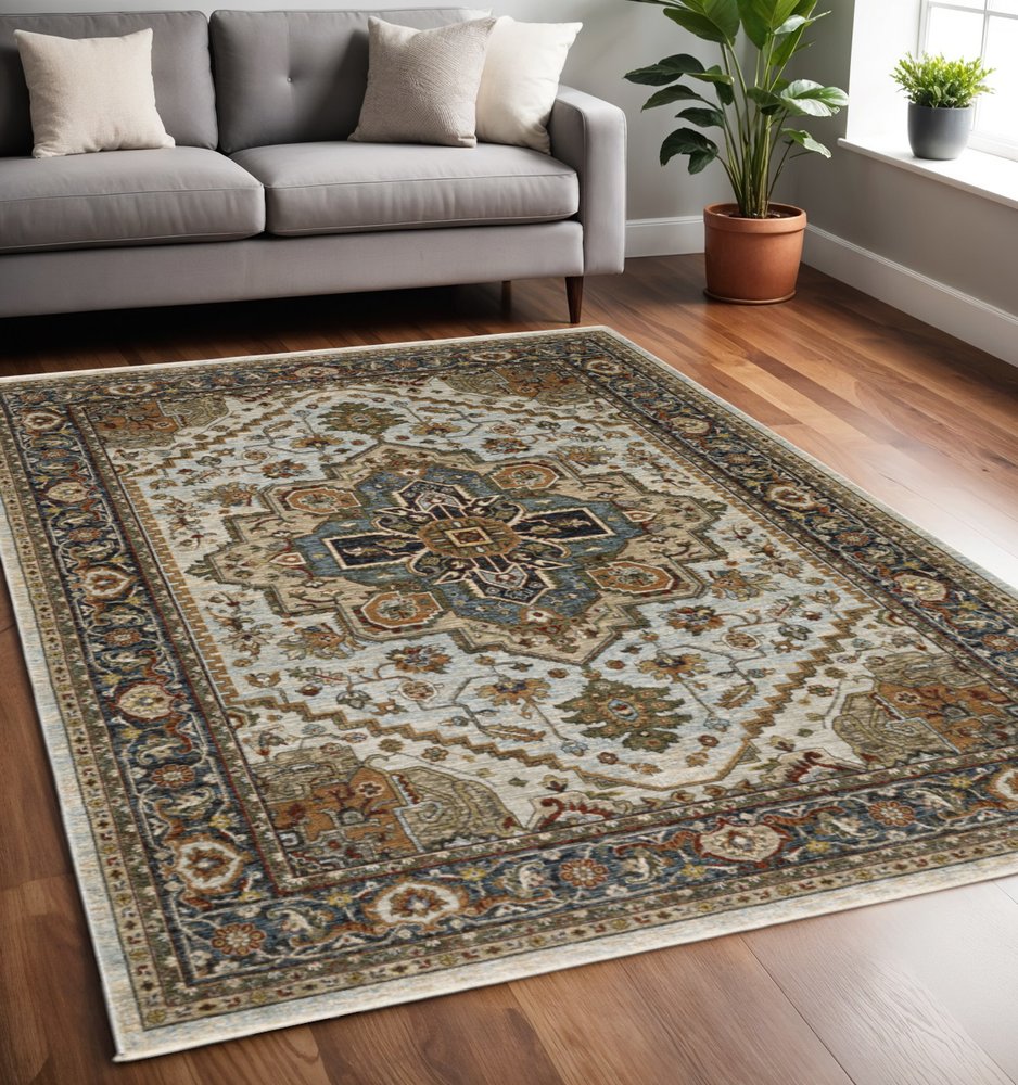 5' X 8' Ivory And Blue Oriental Area Rug With Fringe