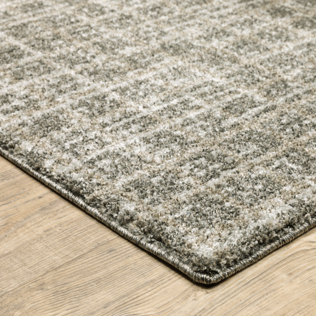 5' X 8' Brown And Beige Geometric Distressed Area Rug