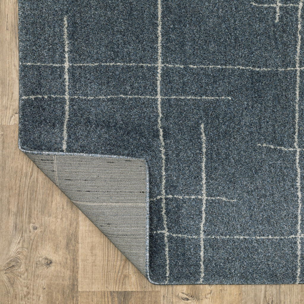 3' X 5' Blue And Beige Geometric Distressed Area Rug