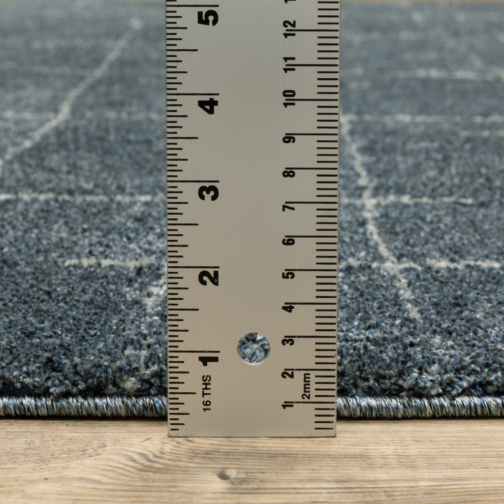 3' X 5' Blue And Beige Geometric Distressed Area Rug