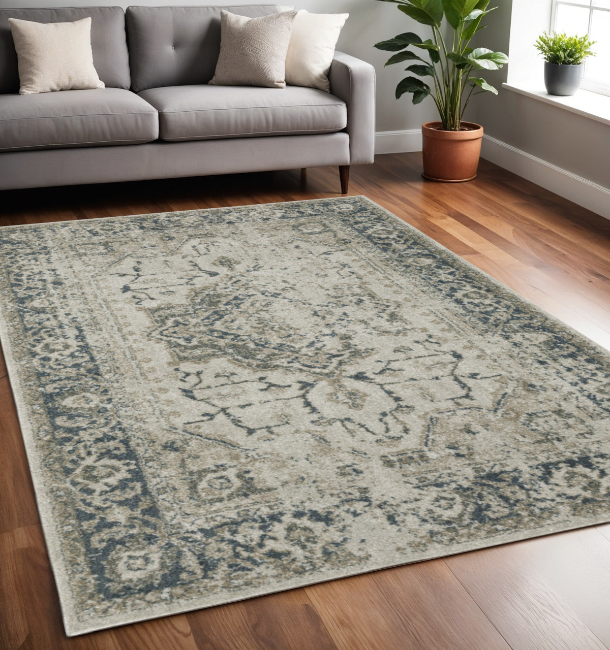 5' X 8' Beige And Blue Oriental Distressed Area Rug