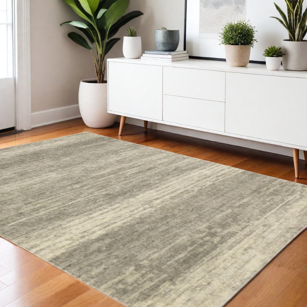 3' X 5' Grey Beige And Tan Abstract Power Loom Stain Resistant Area Rug