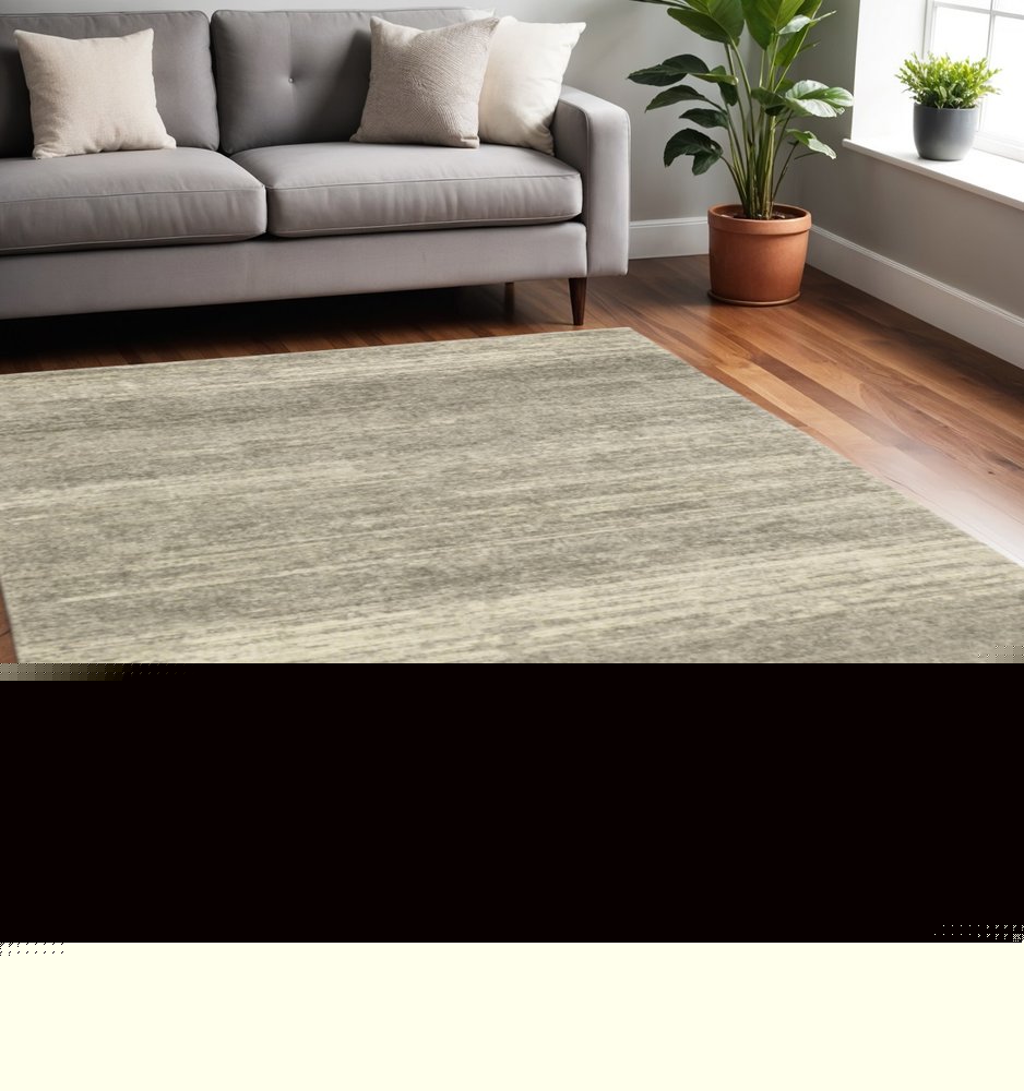 5' X 8' Grey Beige And Tan Abstract Power Loom Stain Resistant Area Rug