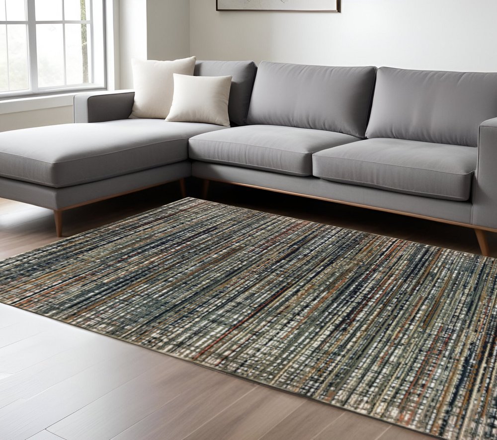 10' X 13' Black Navy Gold Ivory And Blush Abstract Power Loom Stain Resistant Area Rug