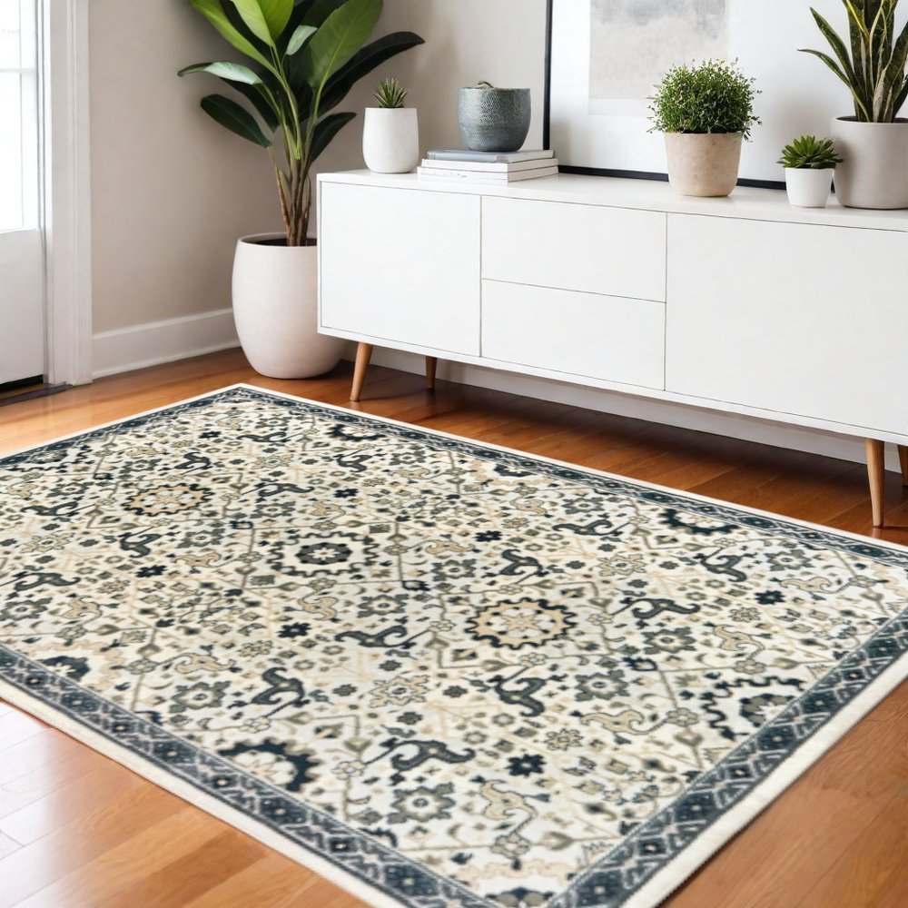 4' X 6' Ivory Navy And Gold Oriental Power Loom Stain Resistant Area Rug