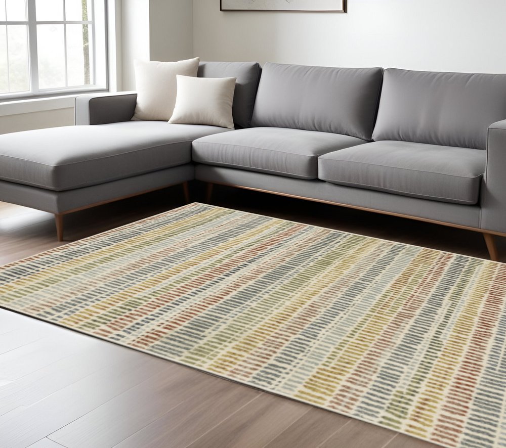 10' X 13' Ivory Blue Green Red And Gold Geometric Power Loom Stain Resistant Area Rug
