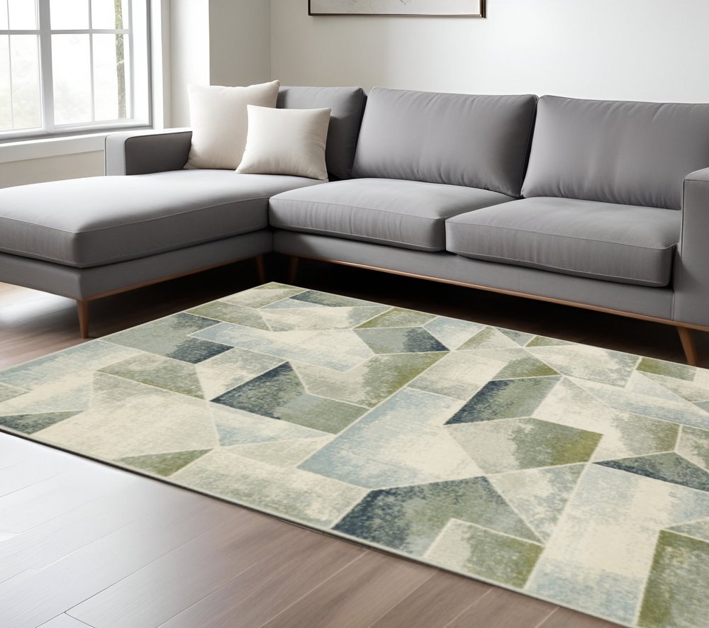 10' X 13' Blue Green Grey Gold And Ivory Geometric Power Loom Stain Resistant Area Rug