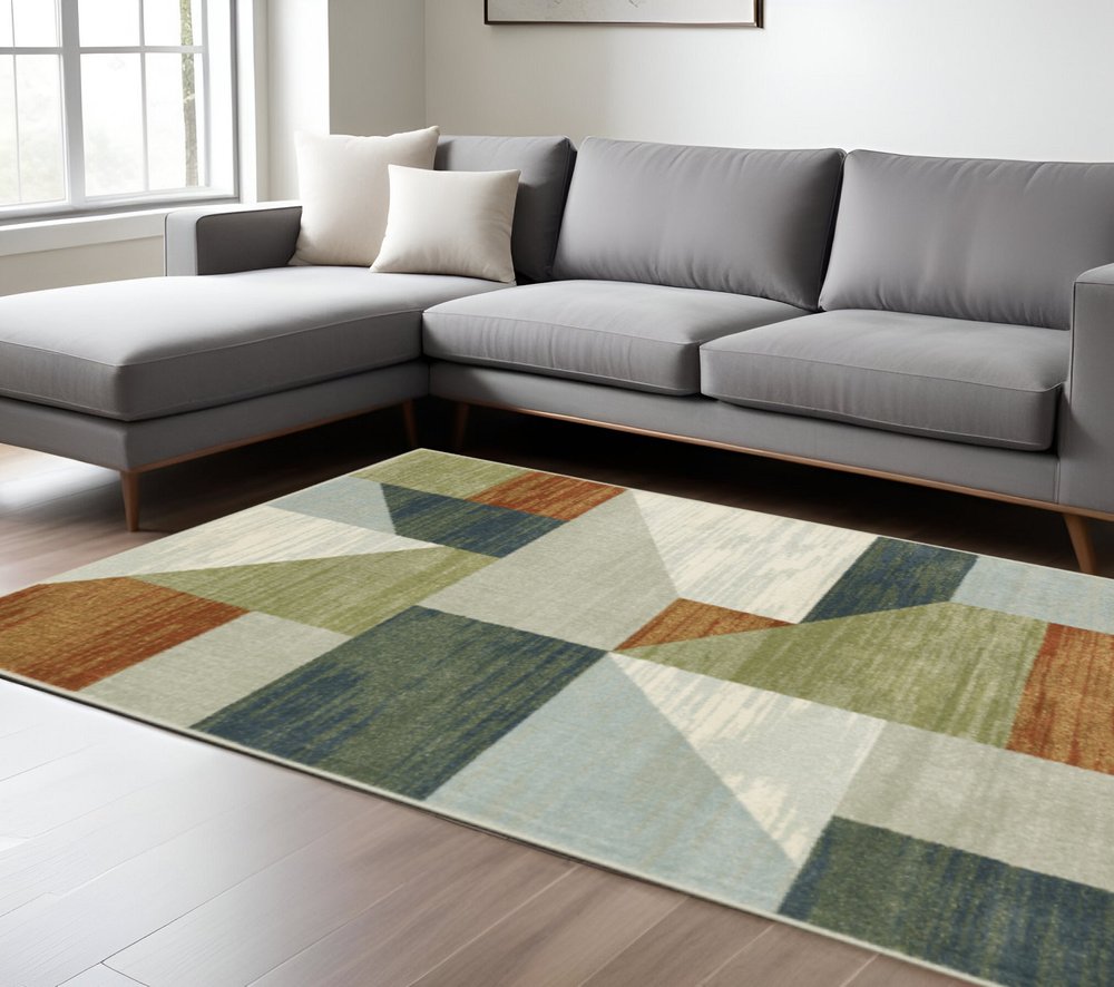 7' X 9' Gray And Ivory Geometric Area Rug