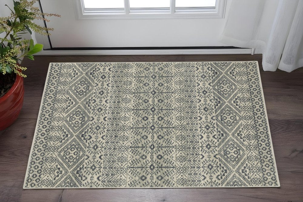 3' X 5' Blue And Beige Geometric Power Loom Stain Resistant Area Rug