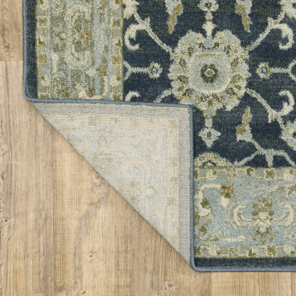 10' X 13' Teal Blue And Ivory Oriental Distressed Area Rug