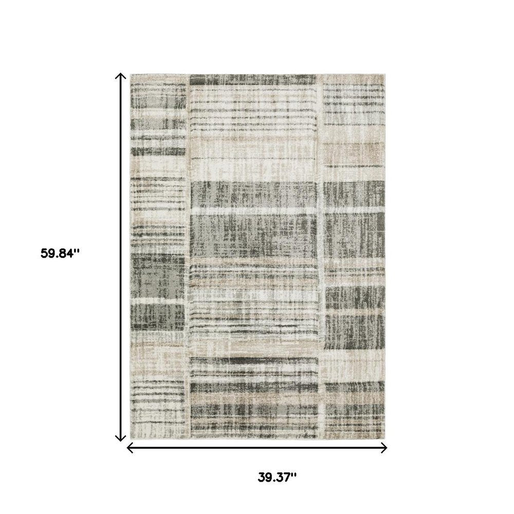 3' X 5' Grey Charcoal Ivory Tan Brown And Beige Geometric Power Loom Stain Resistant Area Rug