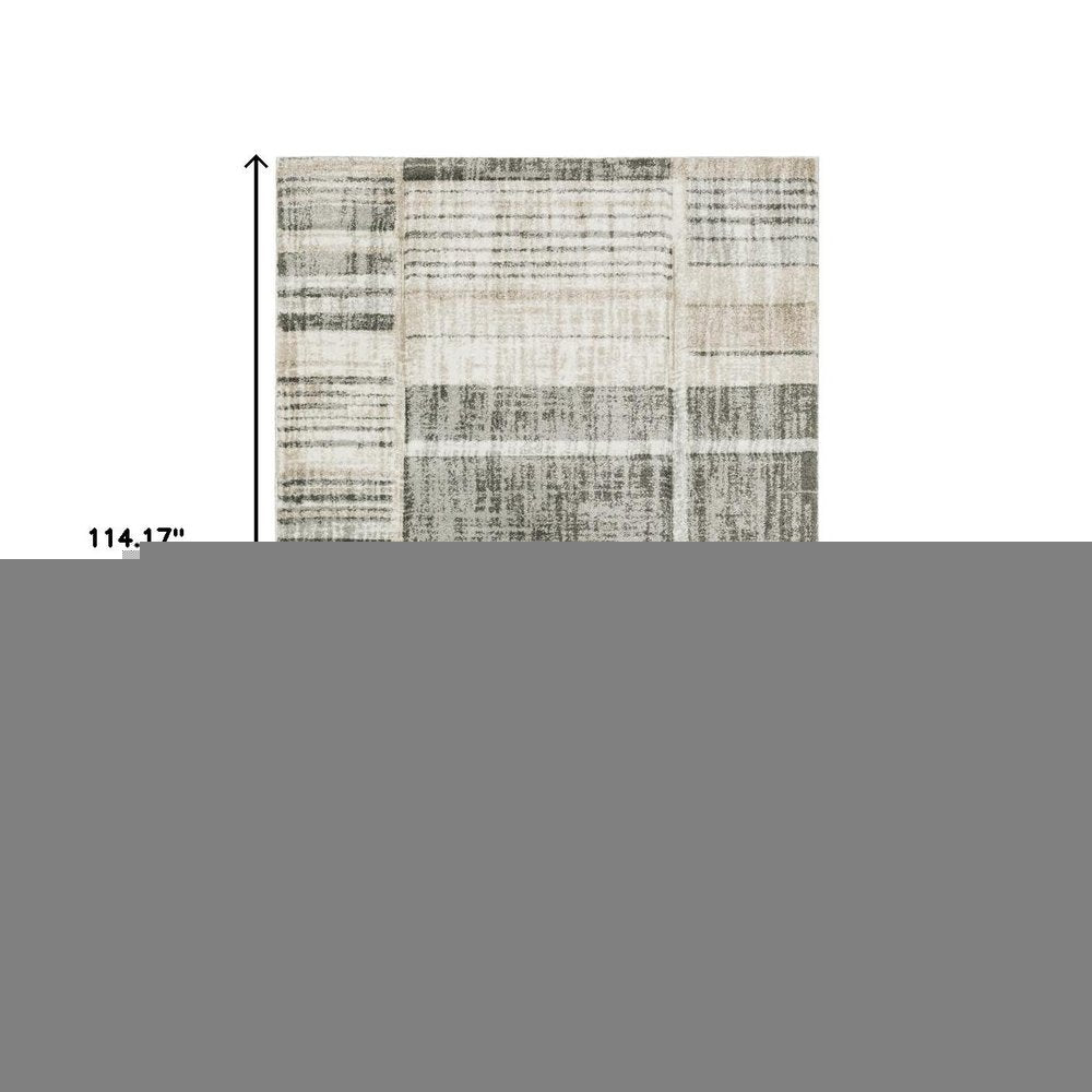6' X 9' Grey Charcoal Ivory Tan Brown And Beige Geometric Power Loom Stain Resistant Area Rug