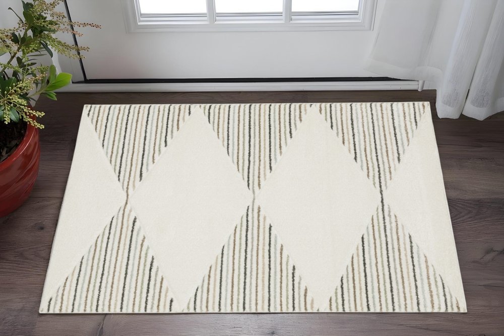 3' X 5' Beige Grey Sage Green Pale Blue Brown And Charcoal Geometric Power Loom Stain Resistant Area Rug
