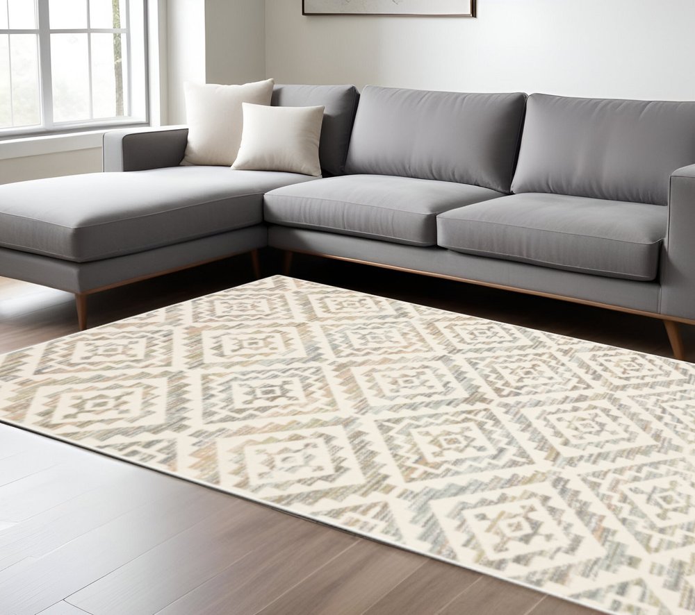 10' X 13' Grey Pink And Sage Geometric Power Loom Stain Resistant Area Rug