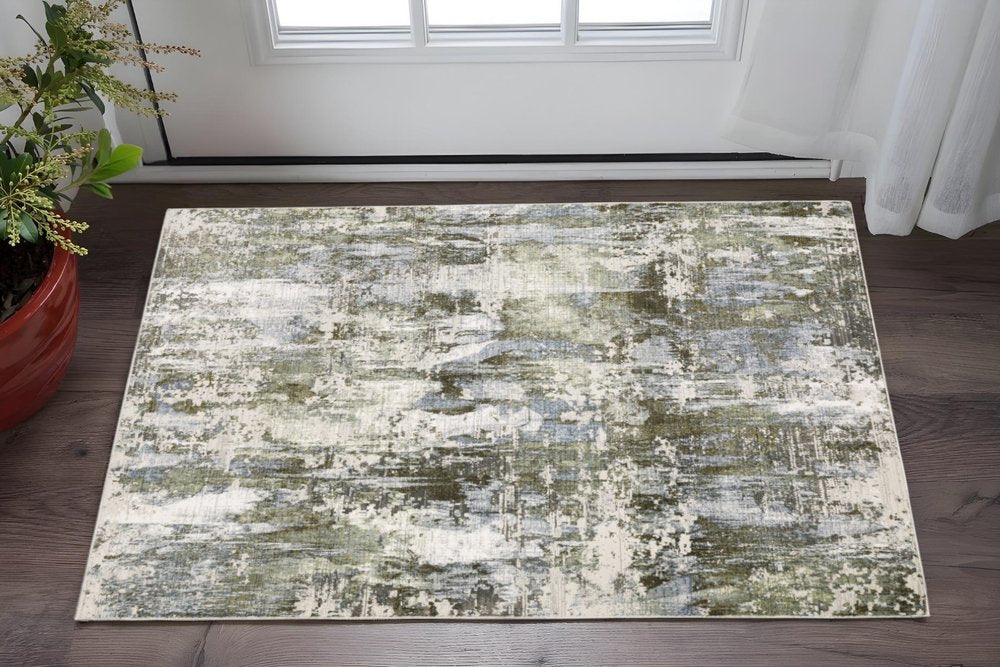 3' X 5' Green Blue Grey Ivory And Brown Abstract Power Loom Stain Resistant Area Rug