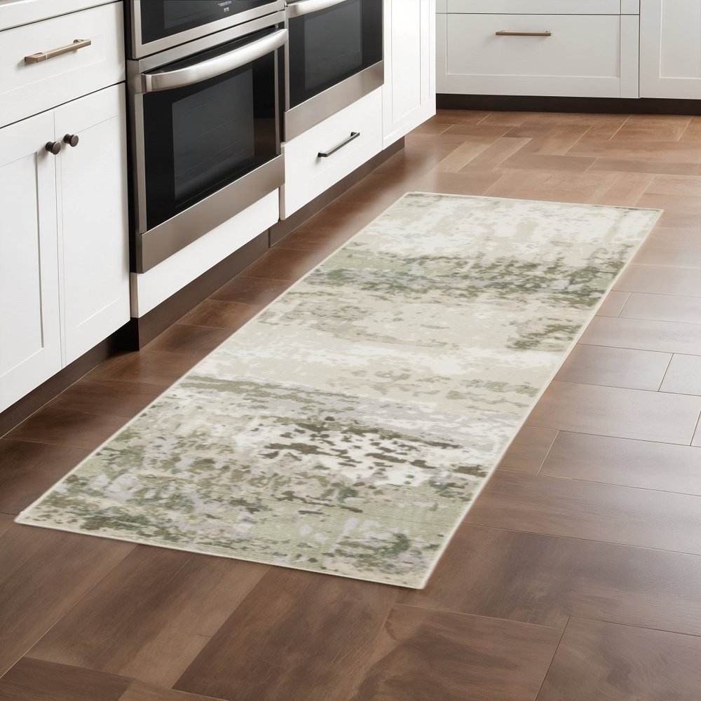 2' X 8' Beige Grey Brown And Sage Green Abstract Power Loom Stain Resistant Runner Rug