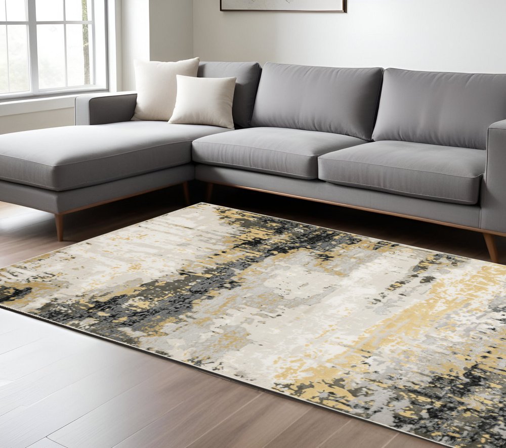 8' X 11' Grey Gold Beige Black And Brown Abstract Power Loom Stain Resistant Area Rug