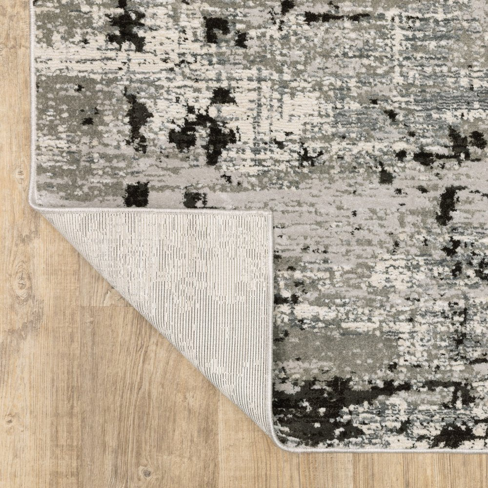 7' X 10' Gray And Black Abstract Distressed Area Rug