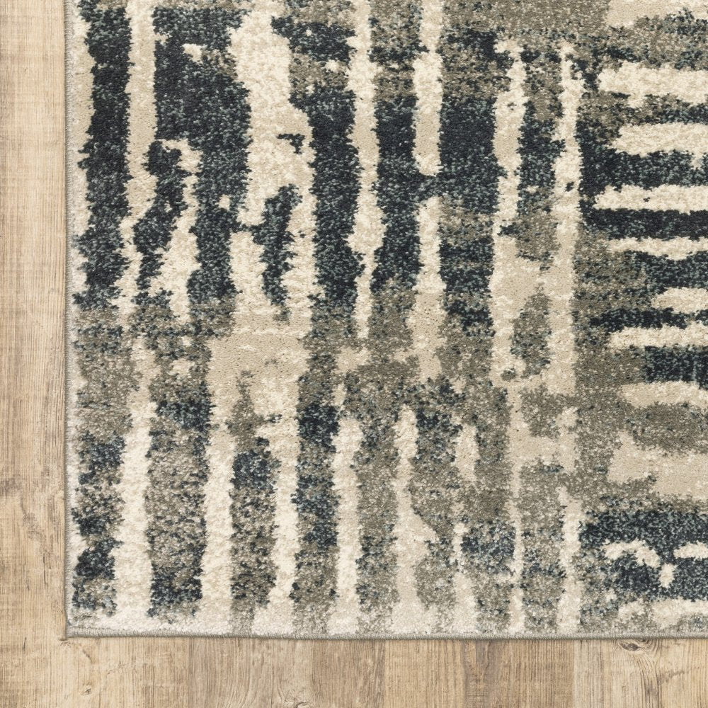 2' X 8' Blue And Beige Abstract Power Loom Stain Resistant Runner Rug