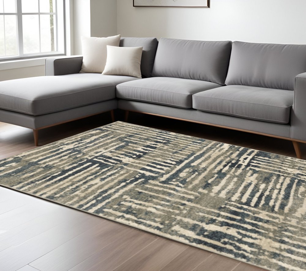 10' X 13' Blue And Beige Abstract Power Loom Stain Resistant Area Rug