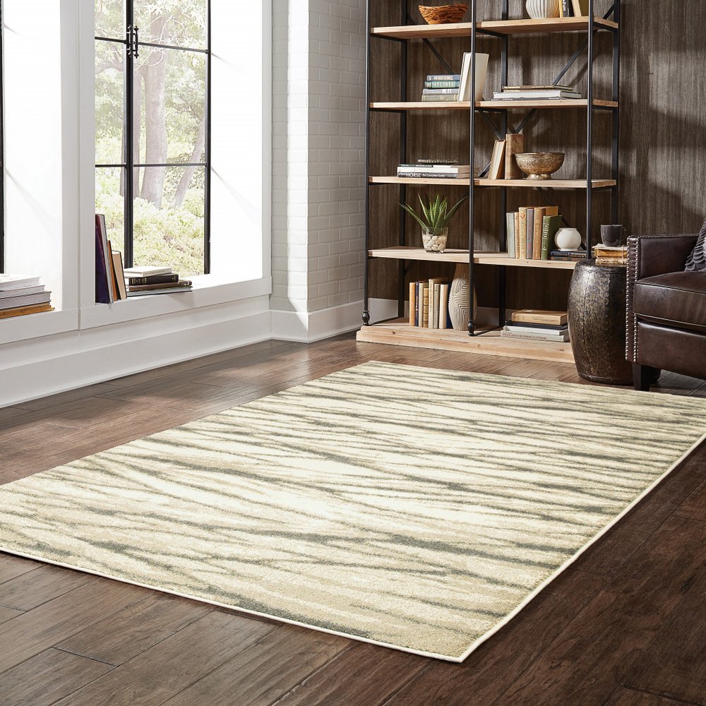 7' X 9' Ivory And Sand Abstract Shag Area Rug
