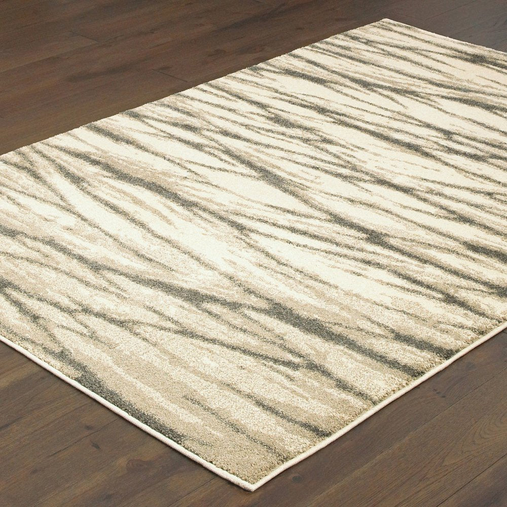 7' X 9' Ivory And Sand Abstract Shag Area Rug