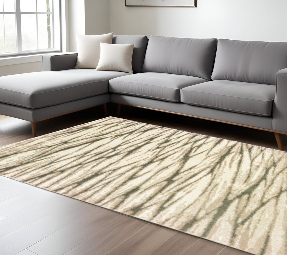 7' X 9' Ivory And Sand Abstract Shag Area Rug