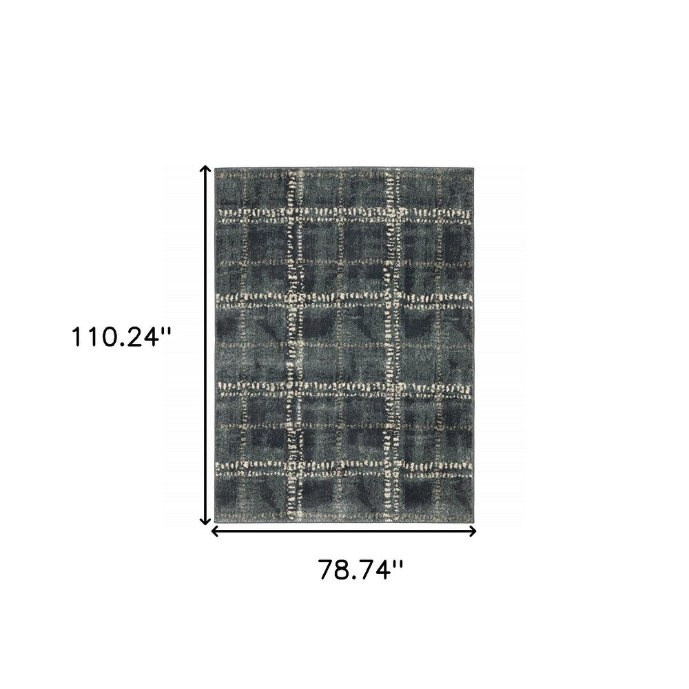 7' X 9' Blue And Ivory Geometric Shag Area Rug