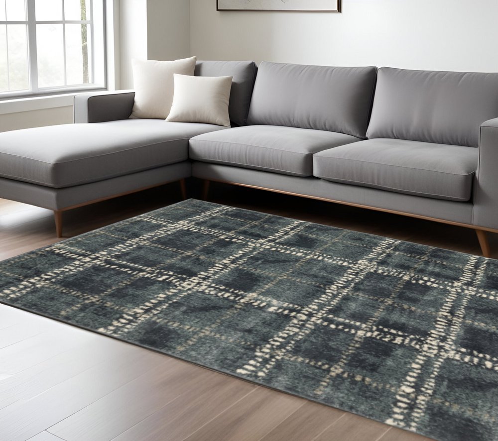 7' X 9' Blue And Ivory Geometric Shag Area Rug