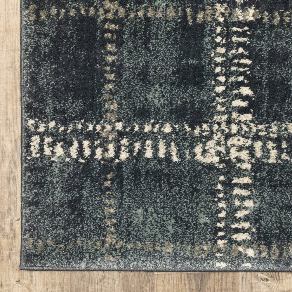 7' X 9' Blue And Ivory Geometric Shag Area Rug