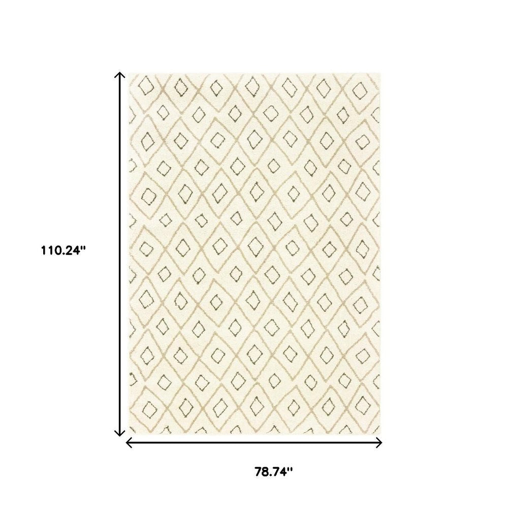 7' X 9' Gray And Ivory Geometric Shag Area Rug