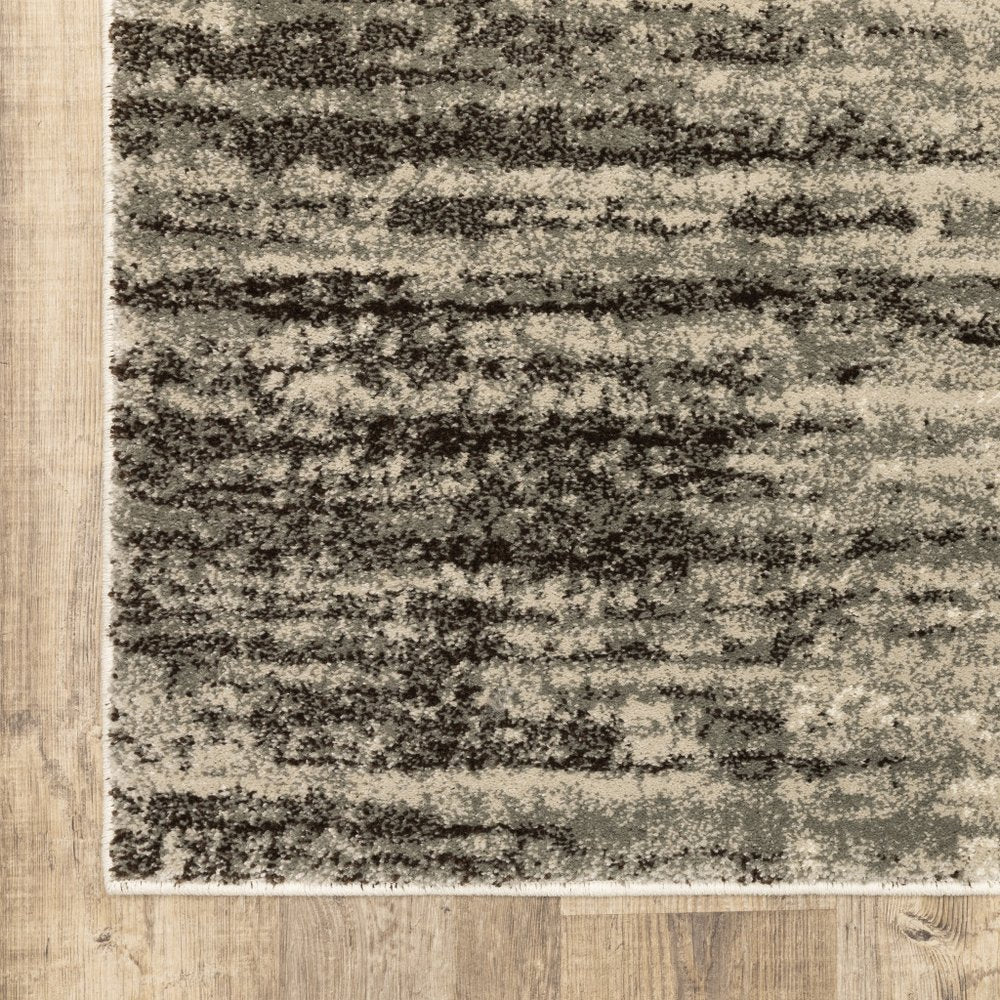2' X 8' Beige And Grey Abstract Power Loom Stain Resistant Runner Rug