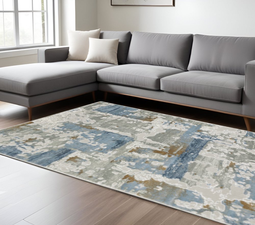 10' X 13' Grey Blue Navy Ivory And Brown Abstract Power Loom Stain Resistant Area Rug