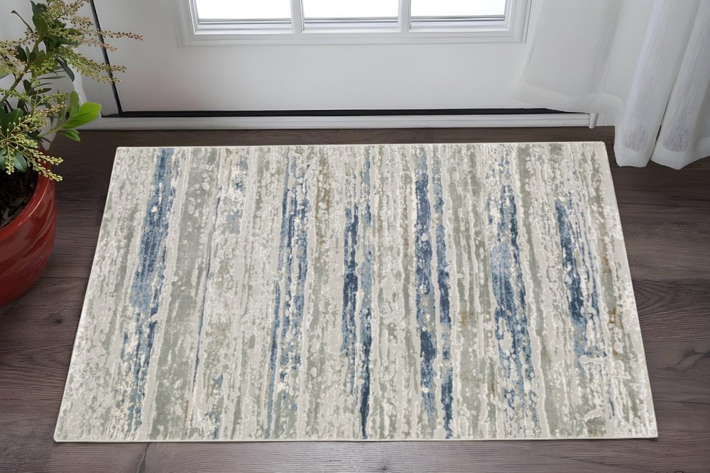 3' X 5' Blue Ivory Grey Light Blue And Brown Abstract Power Loom Stain Resistant Area Rug