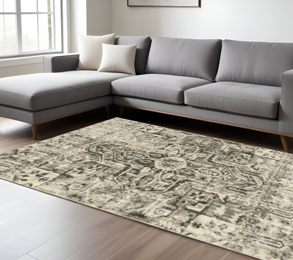 6' X 9' Grey Ivory And Brown Oriental Power Loom Stain Resistant Area Rug