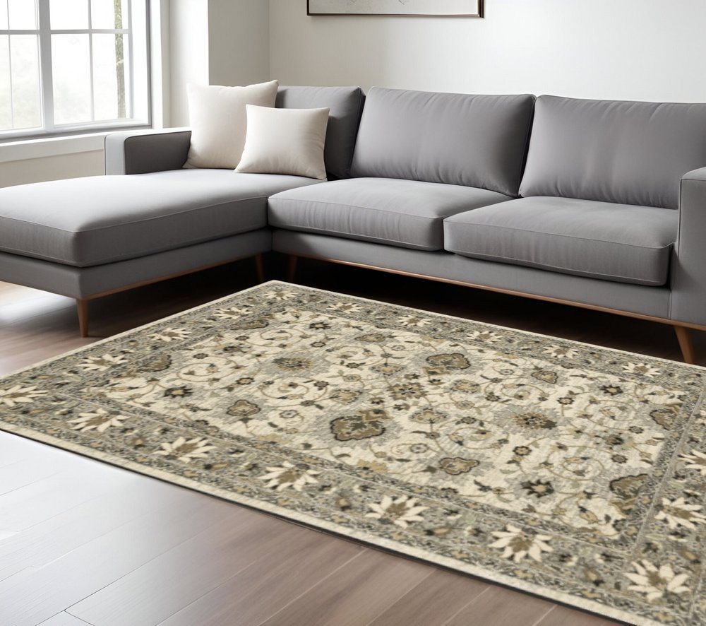 6' X 9' Beige Grey Brown And Charcoal Oriental Power Loom Stain Resistant Area Rug