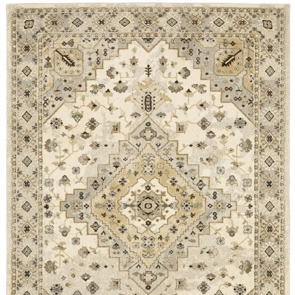 10' X 13' Beige Grey Tan And Brown Oriental Power Loom Stain Resistant Area Rug
