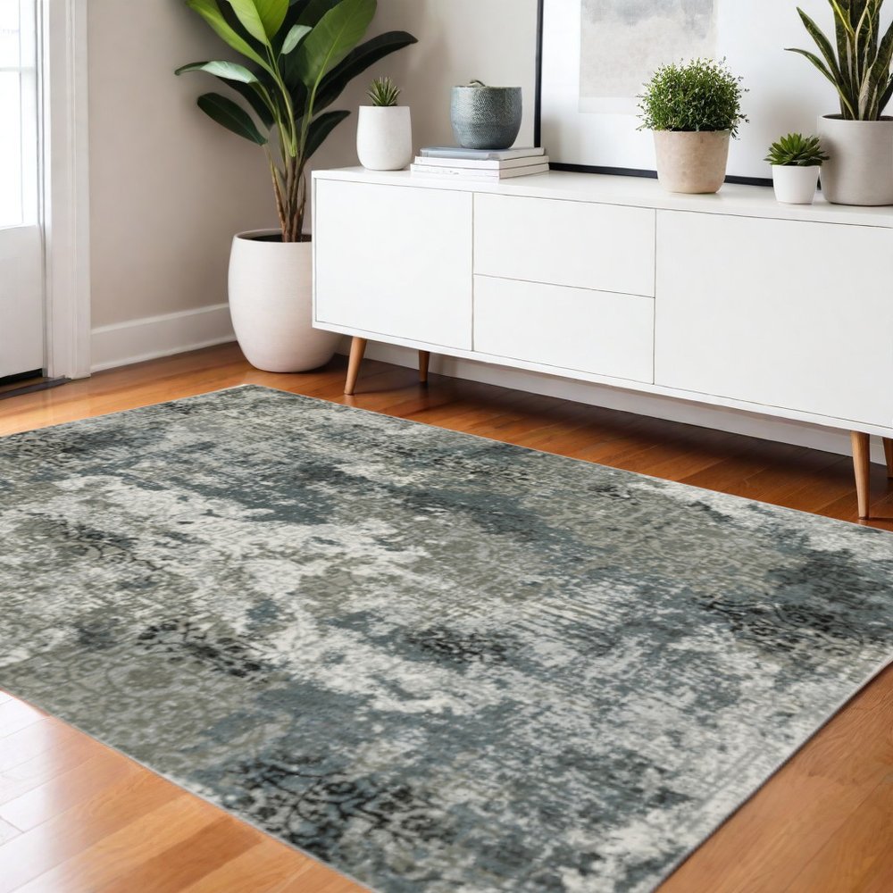 4' X 6' Ivory Grey Charcoal Blue And Navy Abstract Power Loom Stain Resistant Area Rug