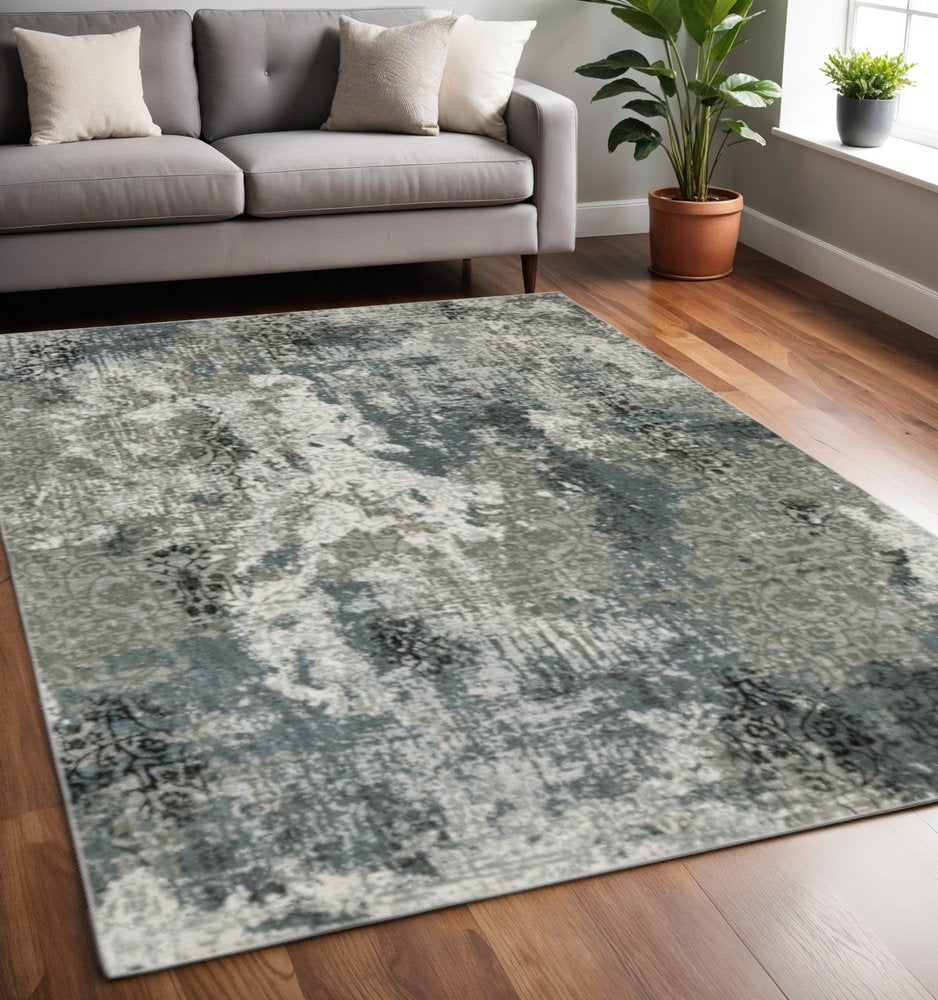 5' X 8' Gray and Ivory Abstract Power Loom Area Rug
