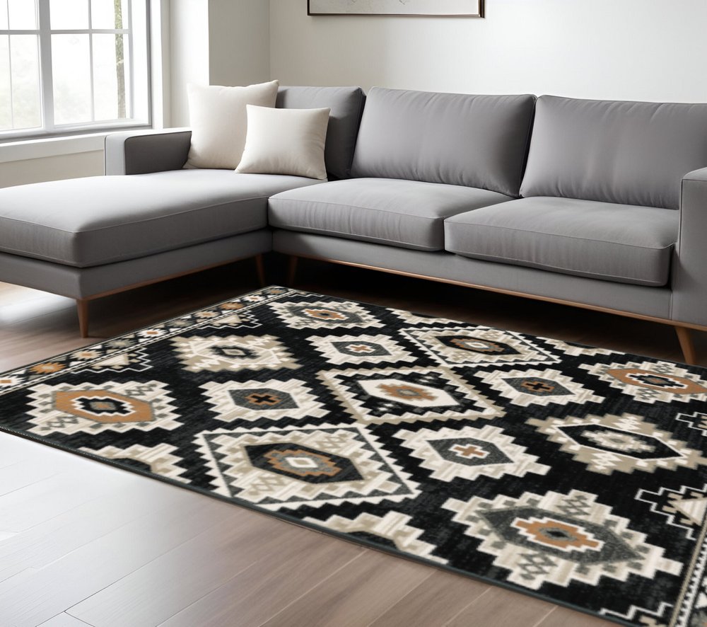 7' X 9' Ivory And Black Southwestern Area Rug