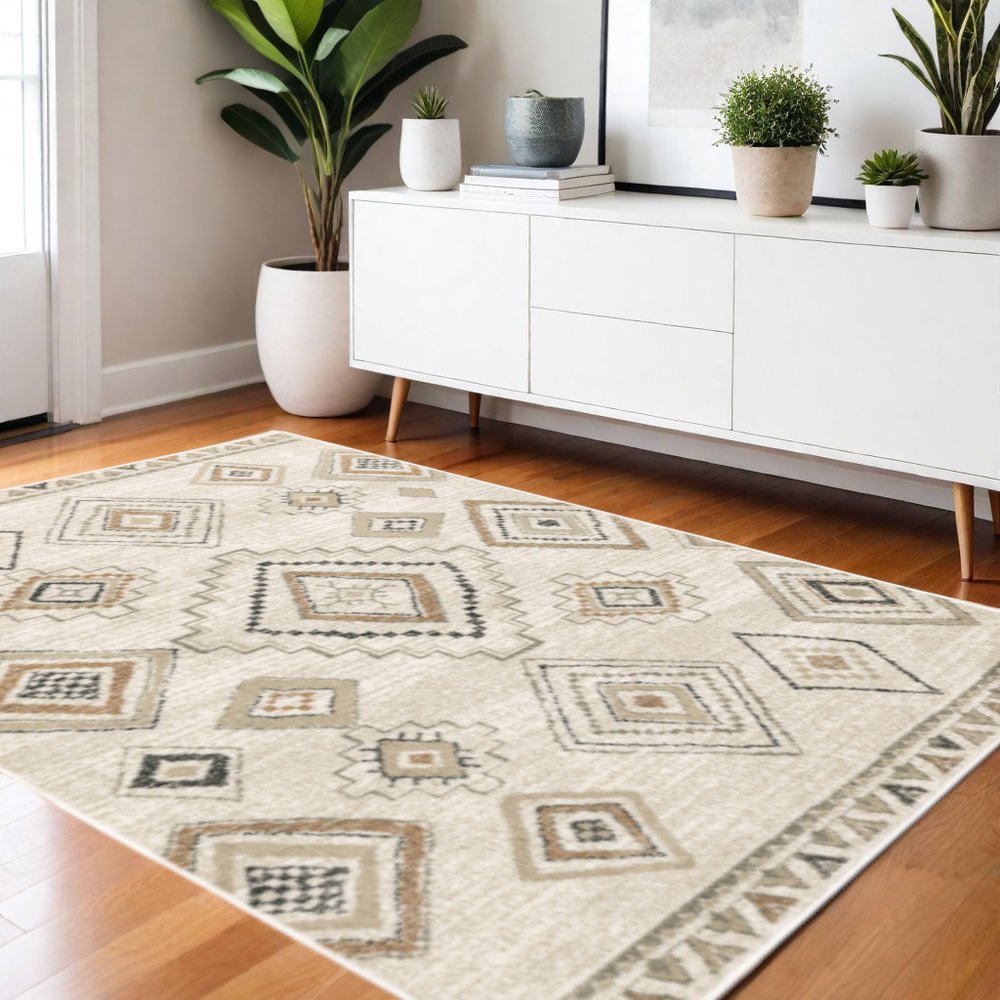 4' X 6' Ivory Orange Tan Black And Grey Southwestern Power Loom Stain Resistant Area Rug